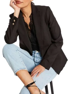 Veste blazer noire unie avec une coupe droite et des manches longues