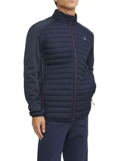 Veste bleue marine matelassée avec une coupe droite et un col montant à zip
