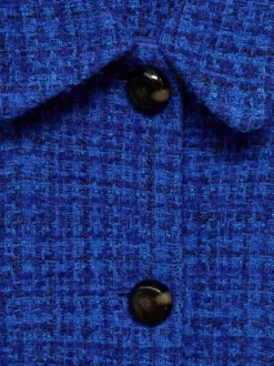 Veste Blouson bleue chinée boutonnée avec une coupe droite et un col français