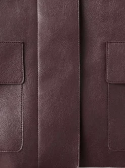 Veste bordeaux unie avec des manches longues et une coupe droite