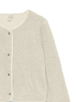 Veste écrue à coupe ajustée pourvue d'un col rond et de manches longues
