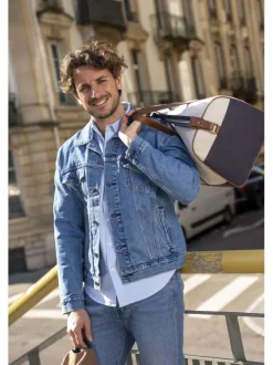 Veste en coton bleu à coupe ajustée pourvu d'un col à revers