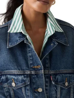 Veste en coton indigo à coupe ajustée pourvue d'un col à revers