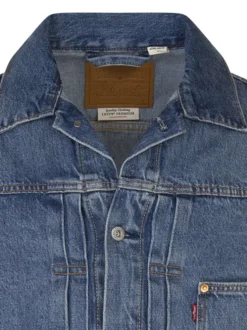 Veste en jean en coton bleu uni avec un poche à gauche de la poitrine