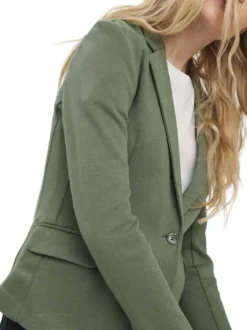 Veste kaki unie pour femme avec un bouton de fermeture à l'avant