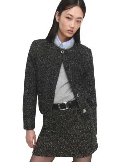 Veste noire en maille jaspée avec une coupe droite et un col rond