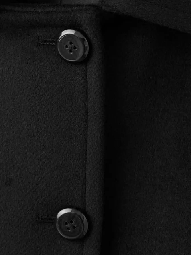 Veste noire unie avec une coupe oversize et des manches longues