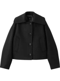 Veste noire unie avec une coupe oversize et des manches longues