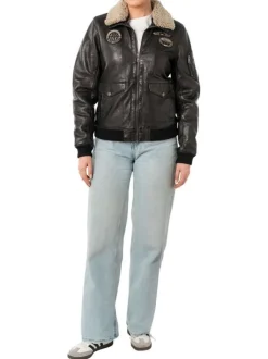 Veste perfecto noire en cuir de mouton avec une coupe bombers et col à rabats
