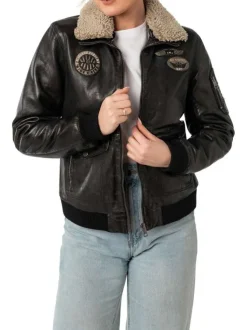 Veste perfecto noire en cuir de mouton avec une coupe bombers et col à rabats