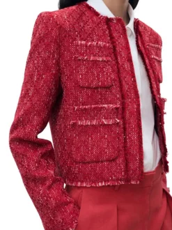 Veste rouge en tweed courte avec un col rond et des détails effilochés