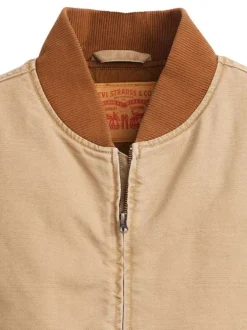 Veste sans manches en coton beige unie avec un col bomber et des grandes poches